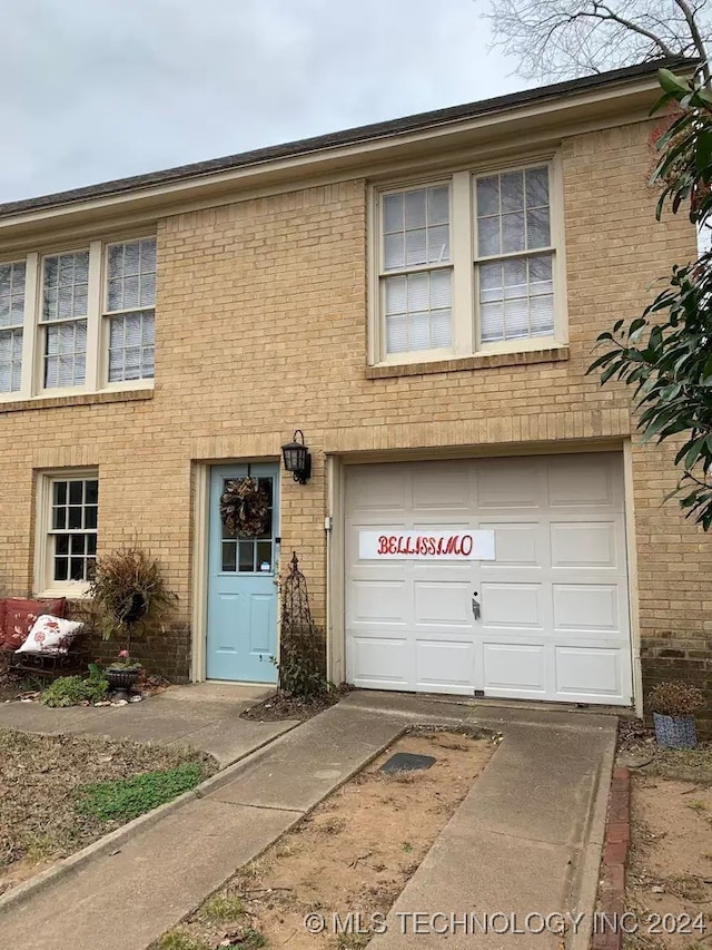 view of property featuring a garage