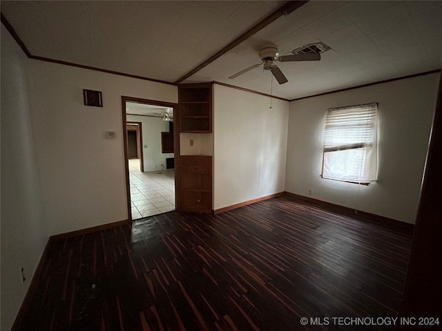 unfurnished room with wood-type flooring, ceiling fan, and ornamental molding