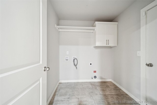 clothes washing area with cabinets, washer hookup, gas dryer hookup, and electric dryer hookup