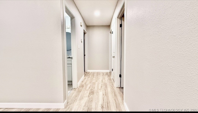 hall featuring light hardwood / wood-style floors