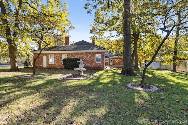 exterior space with a yard