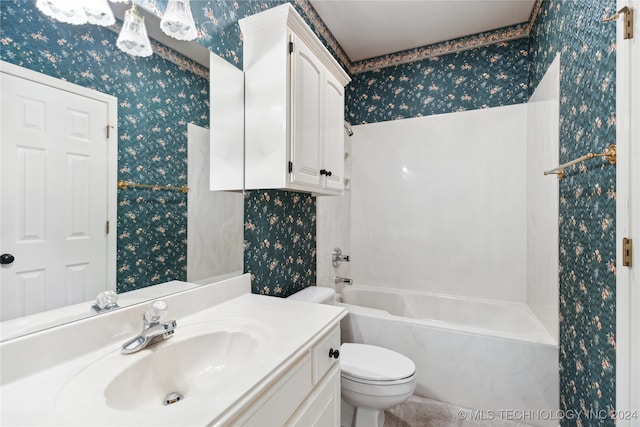 full bathroom featuring bathtub / shower combination, vanity, and toilet