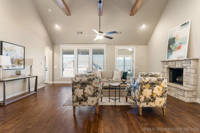 living room with beamed ceiling, dark hardwood / wood-style floors, and high vaulted ceiling