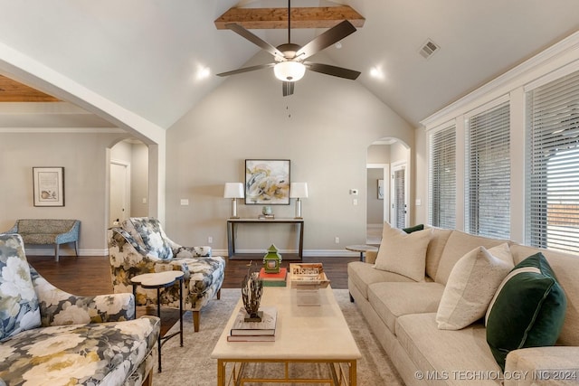 7916 N 145th E Ct, Owasso, OK 74055 - living room with arched walkways, ceiling fan, wood finished floors, and high vaulted ceiling