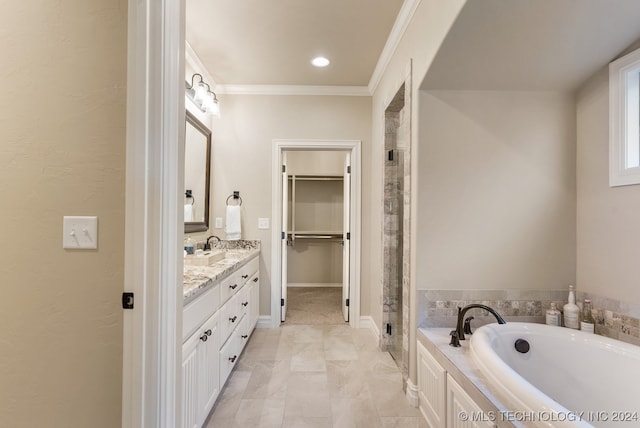 bathroom featuring vanity, ornamental molding, and shower with separate bathtub