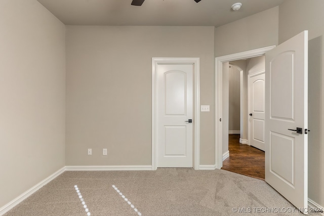 unfurnished bedroom featuring carpet