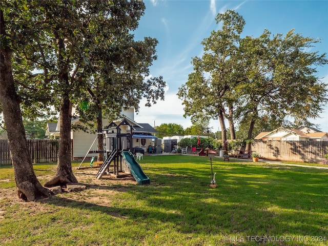 exterior space featuring a playground