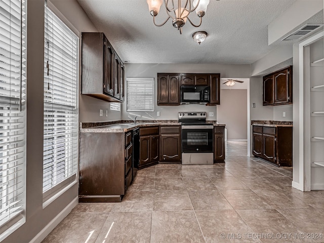 kitchen featuring stainless steel electric range, ceiling fan with notable chandelier, light tile patterned floors, a textured ceiling, and dark brown cabinetry