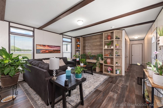 living room with beam ceiling and dark wood-type flooring