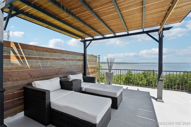 view of patio / terrace featuring a water view and an outdoor hangout area