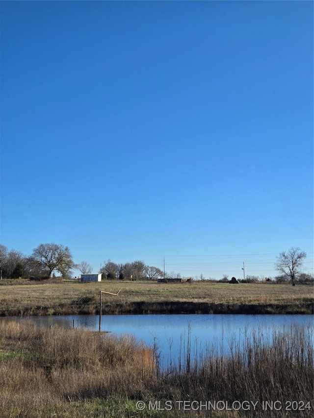 property view of water with a rural view