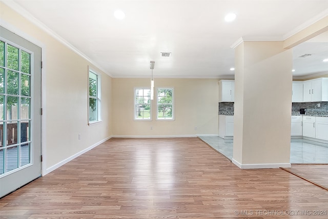 interior space featuring light hardwood / wood-style flooring and ornamental molding