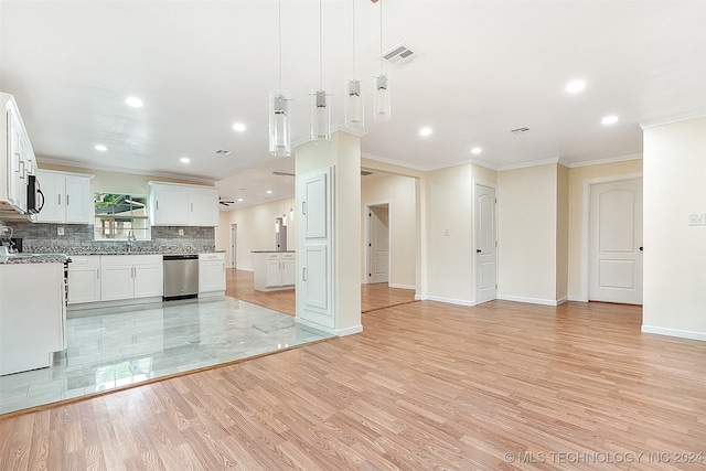 kitchen featuring stainless steel appliances, light stone counters, pendant lighting, white cabinets, and light wood-type flooring