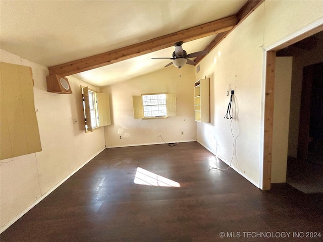 spare room with vaulted ceiling with beams, ceiling fan, and dark hardwood / wood-style flooring