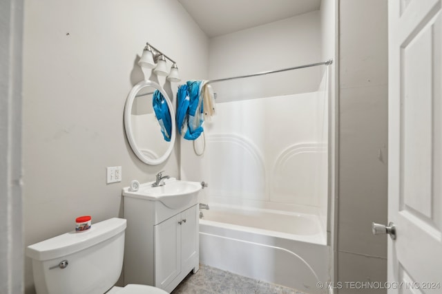 full bathroom featuring vanity, bathtub / shower combination, and toilet