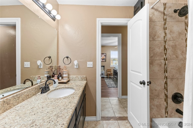 bathroom featuring tile patterned floors and vanity