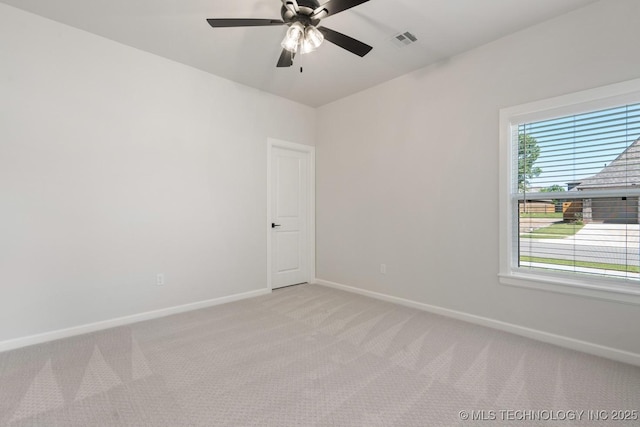 3908 S Elder Blvd, Broken Arrow, OK 74012 - spare room with light colored carpet, baseboards, and a ceiling fan