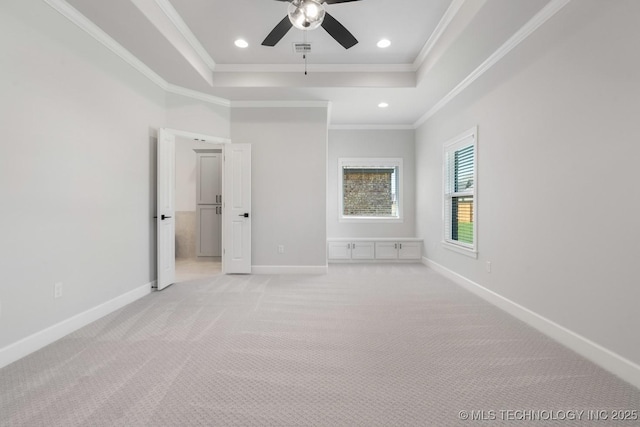 3908 S Elder Blvd, Broken Arrow, OK 74012 - unfurnished bedroom with a tray ceiling, crown molding, light carpet, baseboards, and recessed lighting