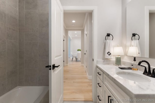 3908 S Elder Blvd, Broken Arrow, OK 74012 - full bath with vanity, wood finished floors, recessed lighting, ornamental molding, and shower / bath combination