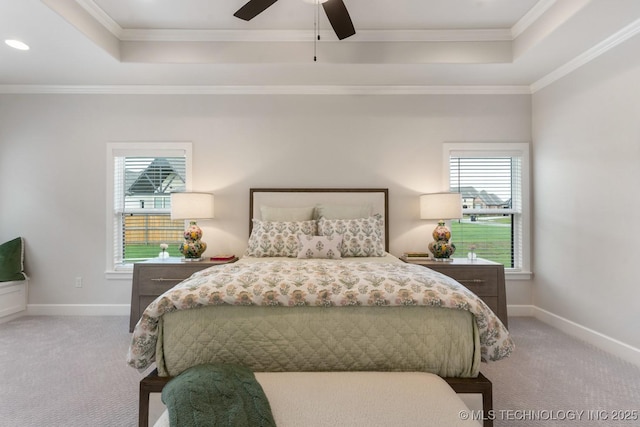 3908 S Elder Blvd, Broken Arrow, OK 74012 - carpeted bedroom featuring a tray ceiling, multiple windows, ornamental molding, recessed lighting, and a ceiling fan