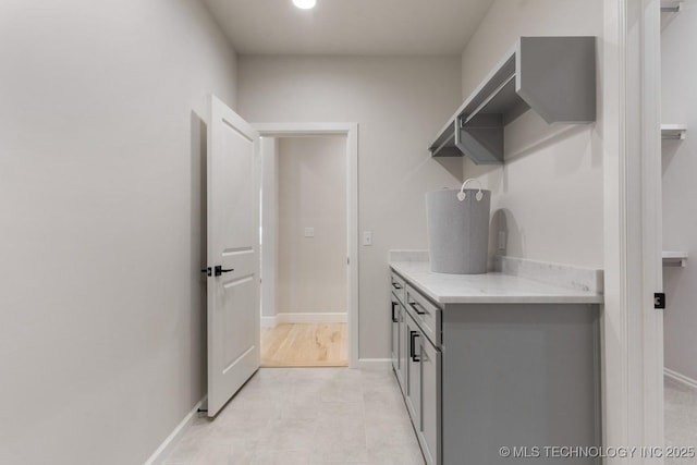 3908 S Elder Blvd, Broken Arrow, OK 74012 - laundry area featuring baseboards