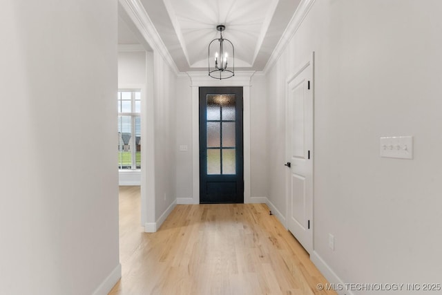 6617 S Fir Ave, Broken Arrow, OK 74134 - foyer with a chandelier, light wood-style floors, ornamental molding, and baseboards