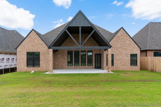 6617 S Fir Ave, Broken Arrow, OK 74134 - back of property featuring brick siding and a patio