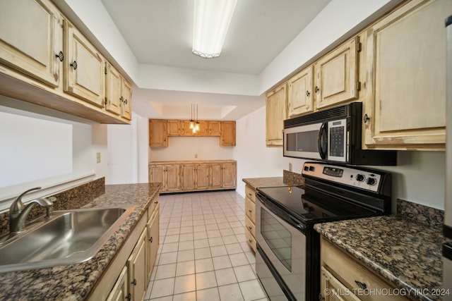 kitchen with sink, light brown cabinets, black range with electric cooktop, pendant lighting, and light tile patterned flooring