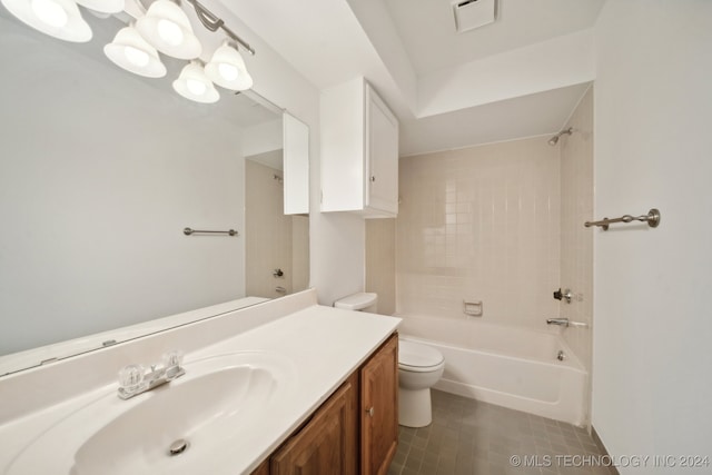 full bathroom featuring vanity, toilet, and tiled shower / bath