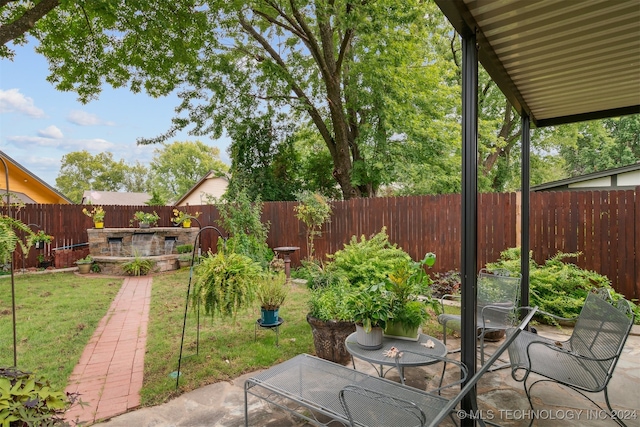 view of yard with a patio area