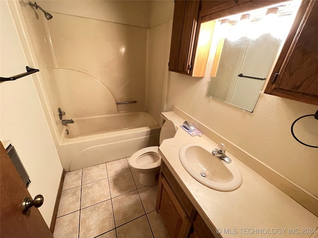 full bathroom with bathtub / shower combination, vanity, tile patterned floors, and toilet