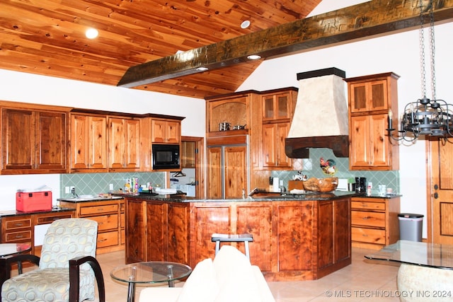 kitchen featuring built in appliances, decorative backsplash, light tile patterned flooring, and custom range hood