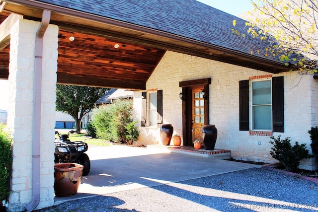 exterior space featuring a carport