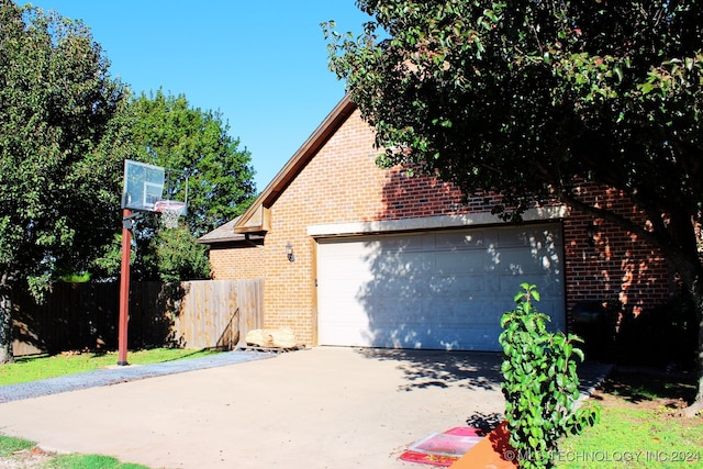 view of side of property with a garage