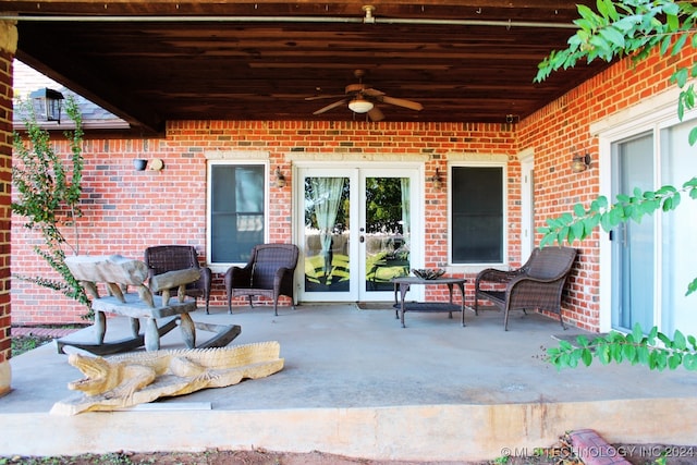 view of patio featuring french doors and ceiling fan