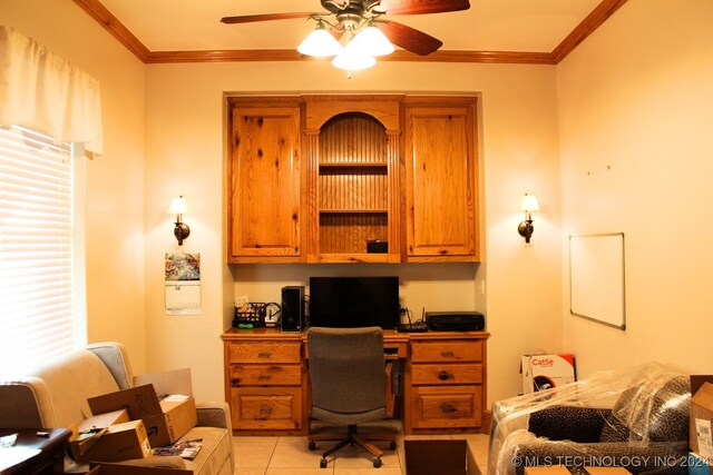 tiled home office featuring crown molding, ceiling fan, and a healthy amount of sunlight