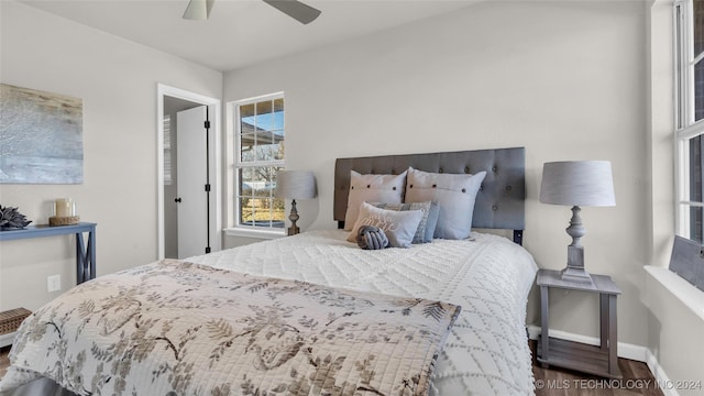 bedroom featuring hardwood / wood-style floors and ceiling fan