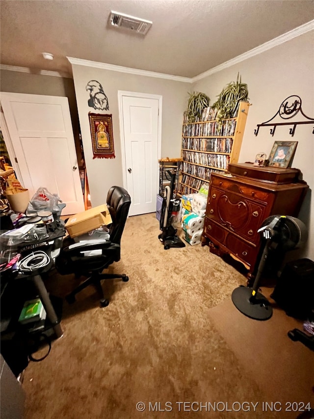 carpeted office with a textured ceiling and ornamental molding