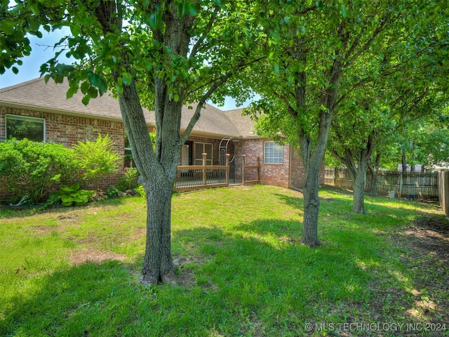 view of yard featuring a deck