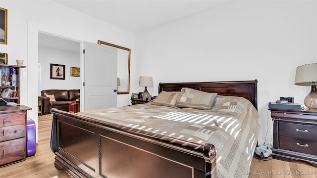 bedroom featuring light wood-type flooring