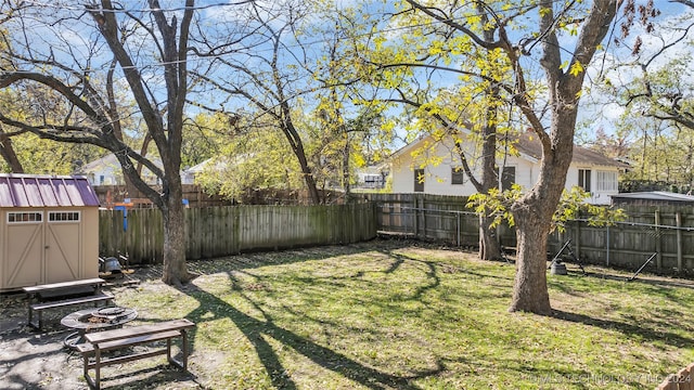 view of yard with a storage shed