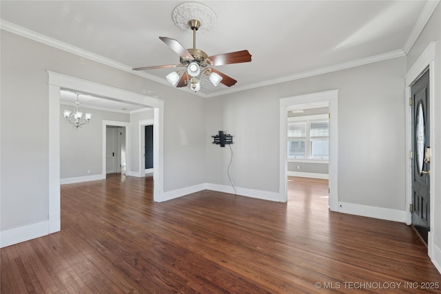 spare room featuring crown molding, dark wood-type flooring, and ceiling fan with notable chandelier