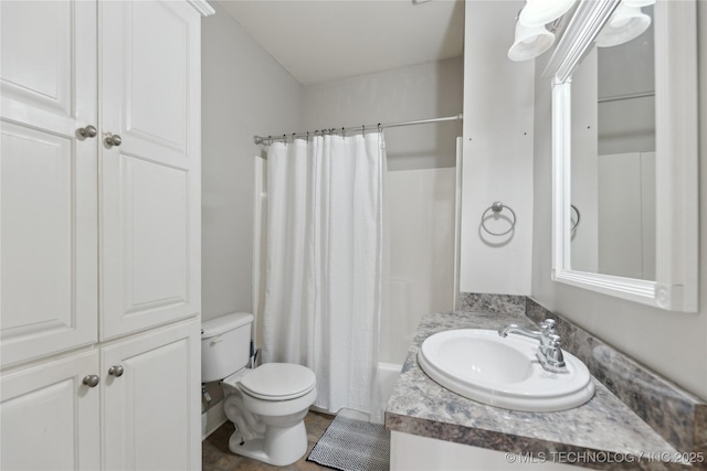 full bathroom with toilet, vanity, and shower / tub combo with curtain