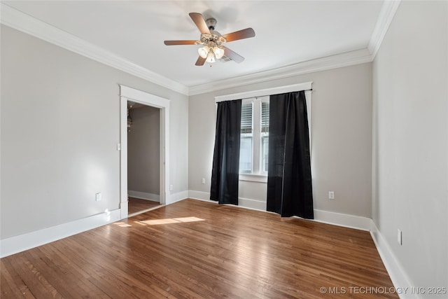 unfurnished room featuring ceiling fan, crown molding, and hardwood / wood-style floors