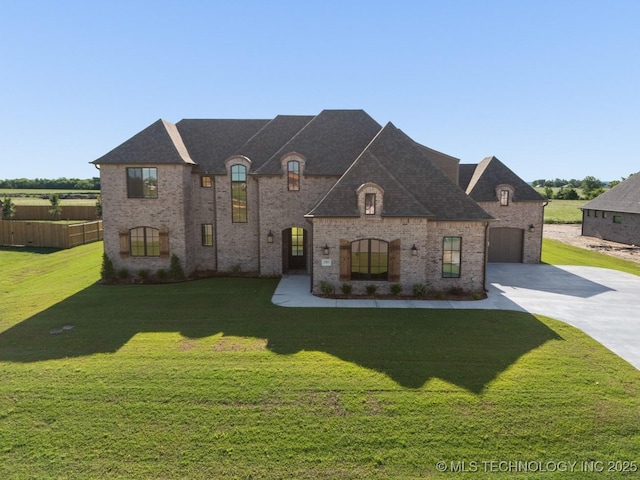 17537 S 56th E Ave, Bixby, OK 74008 - french country style house with concrete driveway and brick siding