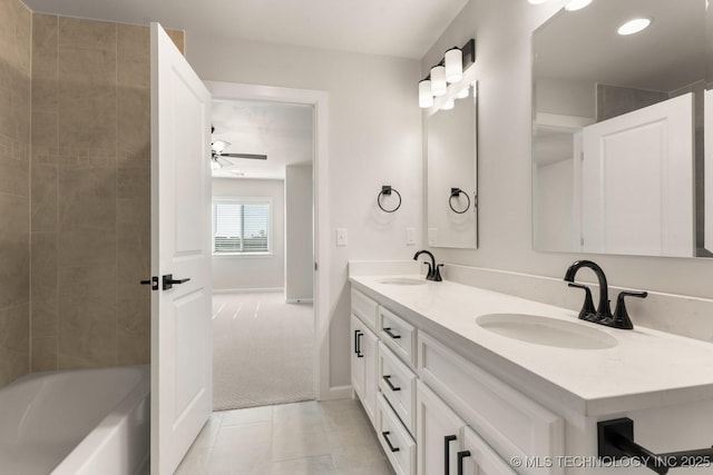 17537 S 56th E Ave, Bixby, OK 74008 - bathroom with double vanity, a ceiling fan, tile patterned flooring, and baseboards