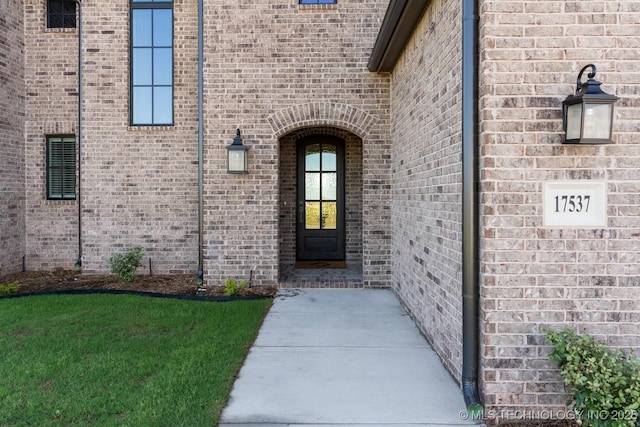 17537 S 56th E Ave, Bixby, OK 74008 - doorway to property with brick siding