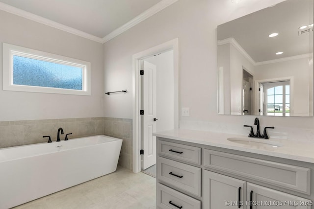 17537 S 56th E Ave, Bixby, OK 74008 - full bathroom featuring vanity, a freestanding tub, ornamental molding, tile patterned floors, and recessed lighting