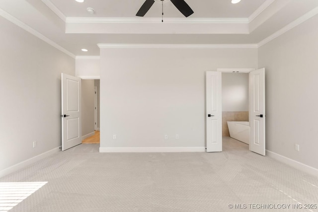 17537 S 56th E Ave, Bixby, OK 74008 - unfurnished bedroom featuring a tray ceiling, light colored carpet, recessed lighting, baseboards, and ornamental molding