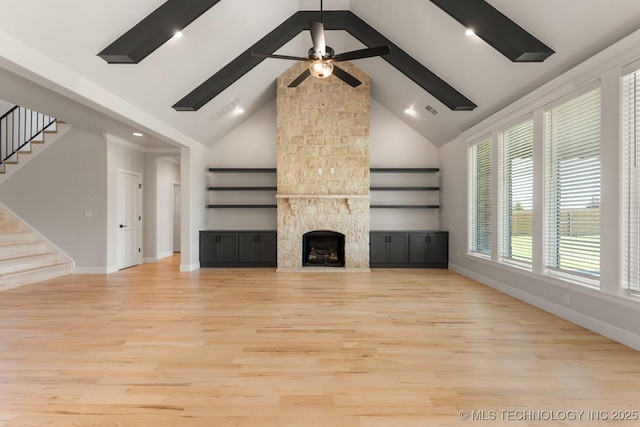 17537 S 56th E Ave, Bixby, OK 74008 - unfurnished living room with light wood finished floors, high vaulted ceiling, stairs, beamed ceiling, and baseboards